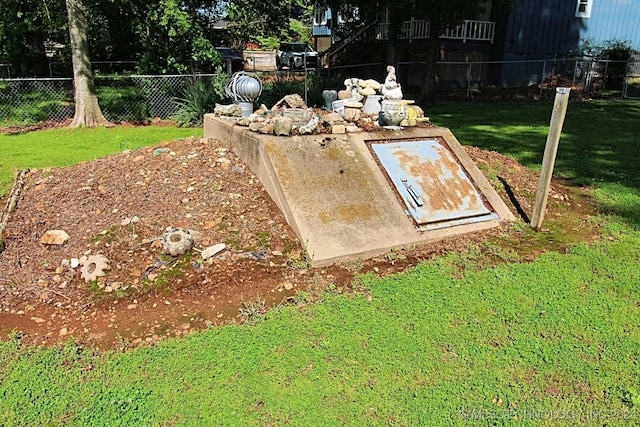 entry to storm shelter with a yard