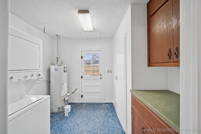 washroom with stacked washing maching and dryer, a textured ceiling, and gas water heater