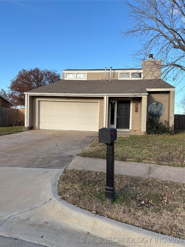 single story home with a garage