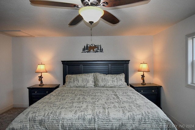 carpeted bedroom featuring multiple windows and ceiling fan