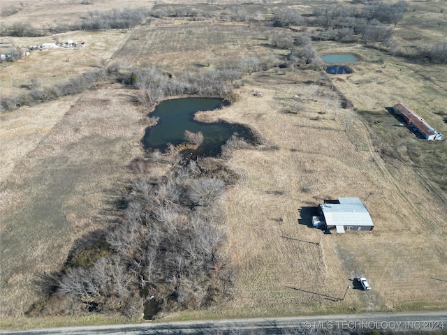 bird's eye view with a rural view and a water view