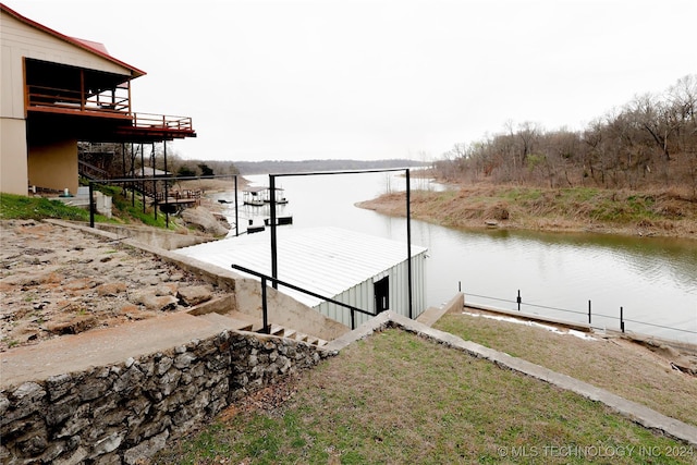 dock area featuring a water view