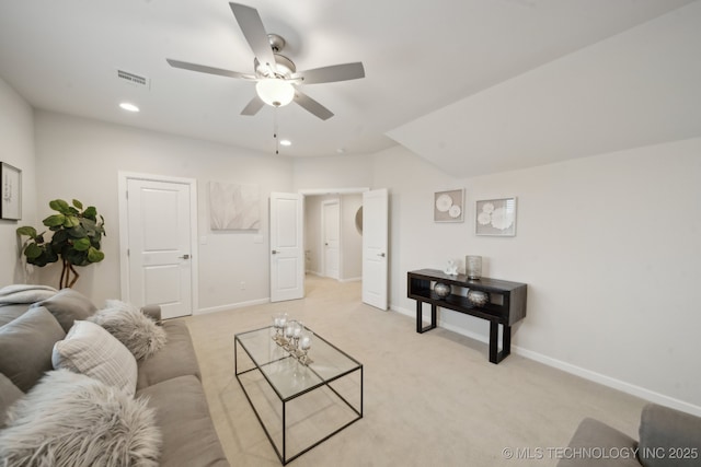 living area featuring recessed lighting, visible vents, light carpet, and baseboards