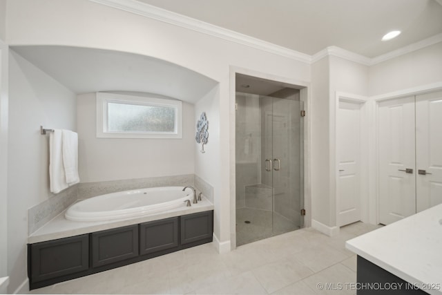 full bath with crown molding, a stall shower, vanity, a bath, and tile patterned floors