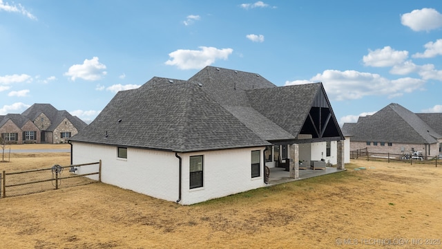 birds eye view of property with a residential view