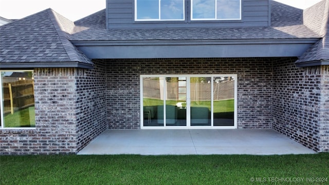 rear view of property with a patio area