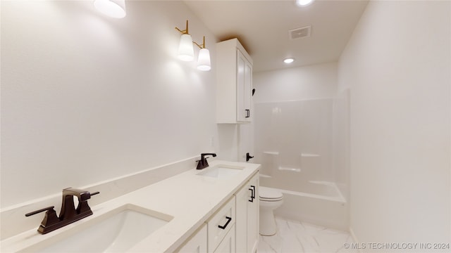 full bathroom with vanity, toilet, and shower / washtub combination