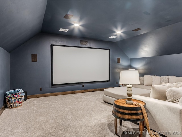 carpeted cinema with vaulted ceiling