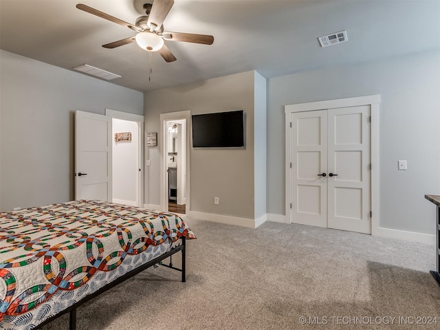 carpeted bedroom featuring ceiling fan