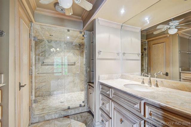 bathroom with crown molding, vanity, and walk in shower