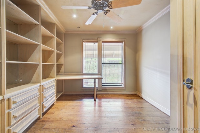 unfurnished office featuring ceiling fan, light hardwood / wood-style flooring, and crown molding