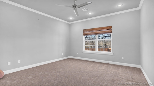 unfurnished room featuring carpet flooring, ceiling fan, and ornamental molding