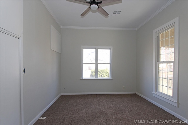 unfurnished room featuring ceiling fan, carpet floors, and ornamental molding