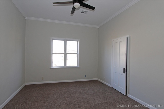 empty room featuring carpet, ceiling fan, and crown molding