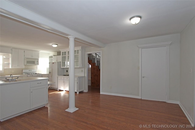 kitchen featuring white cabinets, dark hardwood / wood-style floors, white appliances, and sink