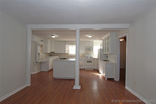 kitchen featuring white cabinetry, sink, dark hardwood / wood-style floors, backsplash, and white appliances