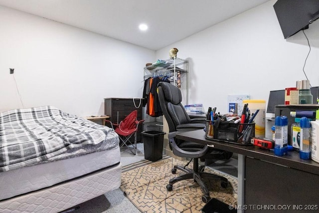 bedroom featuring speckled floor and recessed lighting