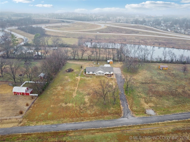 aerial view featuring a water view and a rural view