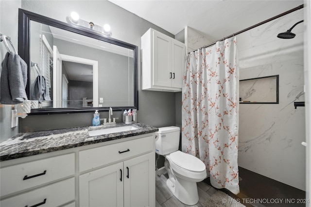 bathroom featuring vanity, toilet, and walk in shower