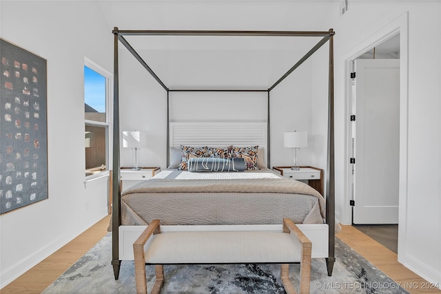 bedroom featuring light wood-type flooring