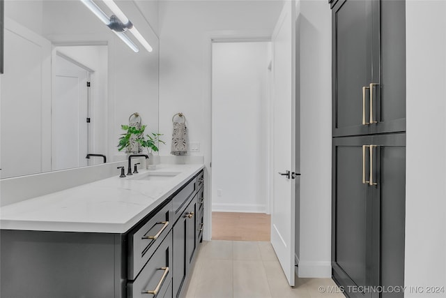 bathroom featuring vanity and tile patterned floors