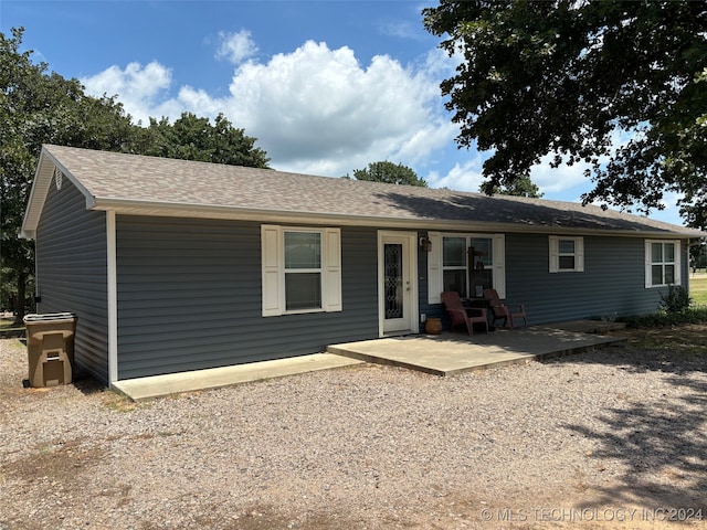 view of front of house with a patio area