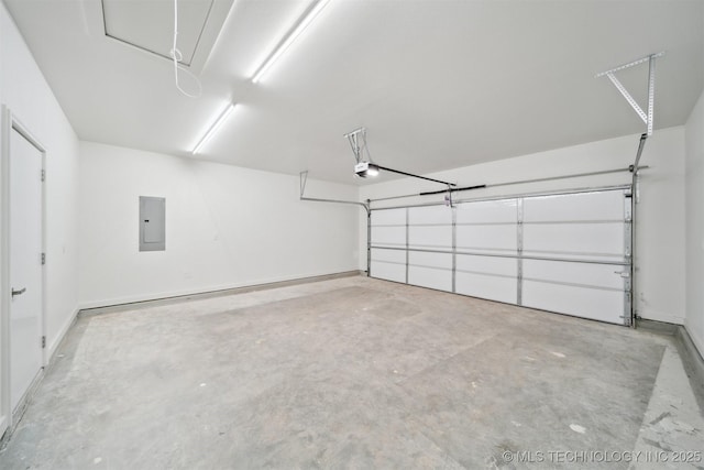 garage with electric panel and a garage door opener