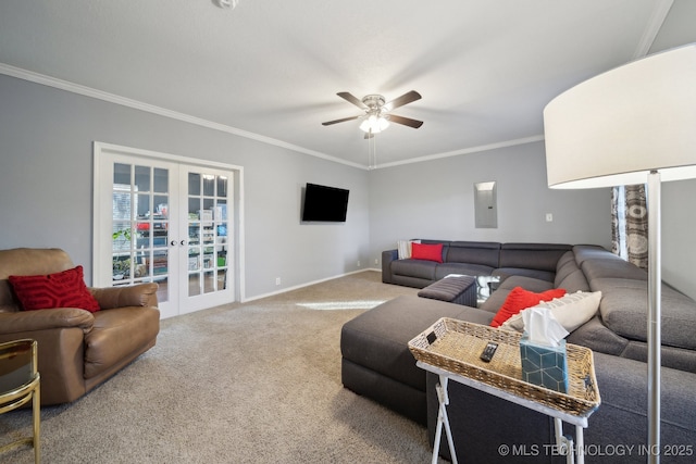 living room featuring ceiling fan, french doors, electric panel, carpet, and ornamental molding