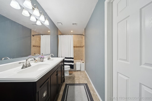 full bathroom with shower / bath combo with shower curtain, vanity, and toilet