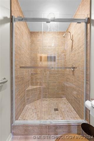 bathroom with an enclosed shower