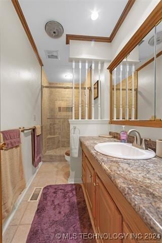 bathroom with toilet, tile patterned floors, an enclosed shower, crown molding, and vanity