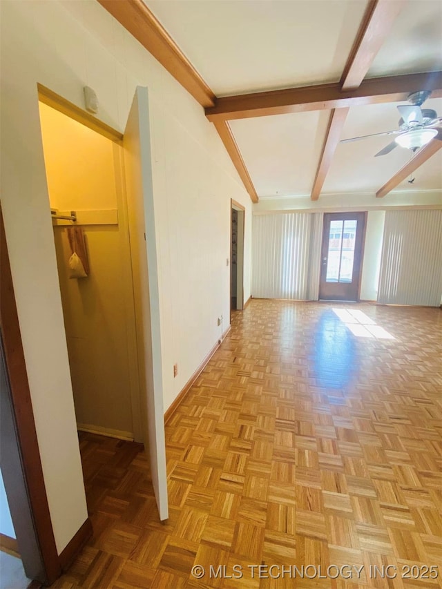 bonus room featuring ceiling fan, light parquet flooring, and lofted ceiling with beams