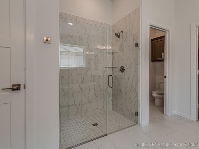 full bath with marble finish floor, a marble finish shower, and toilet