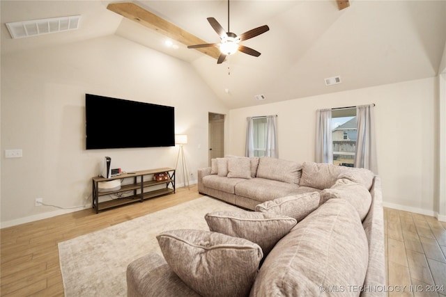 living room with vaulted ceiling with beams, ceiling fan, and light hardwood / wood-style floors