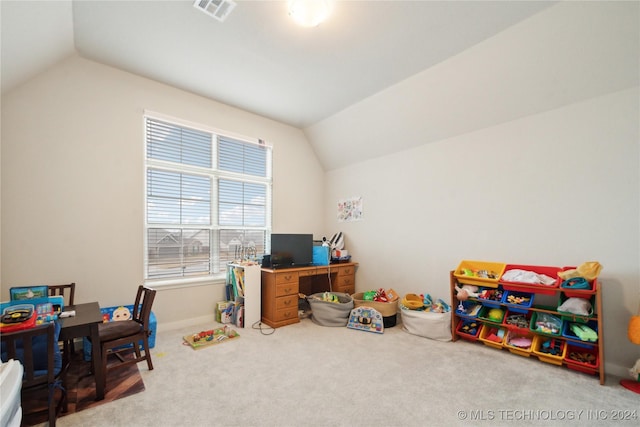 rec room with carpet flooring and vaulted ceiling