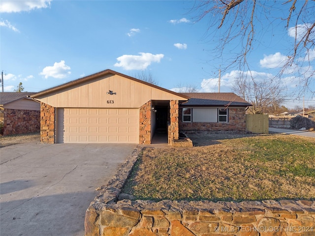 single story home with a garage