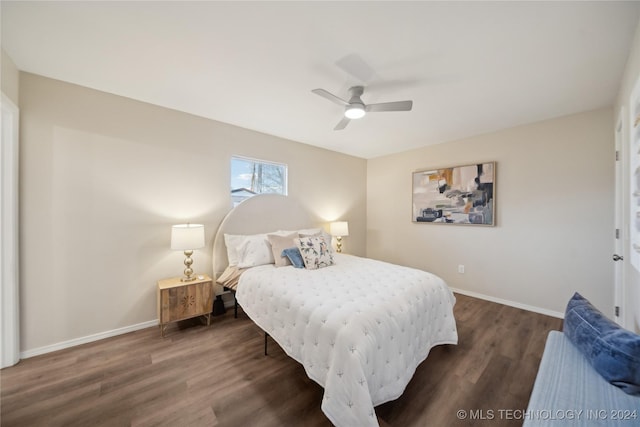 bedroom with ceiling fan and dark hardwood / wood-style floors