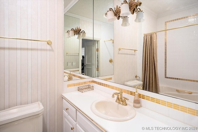 full bathroom with vanity, an inviting chandelier, shower / bath combination with curtain, toilet, and ornamental molding