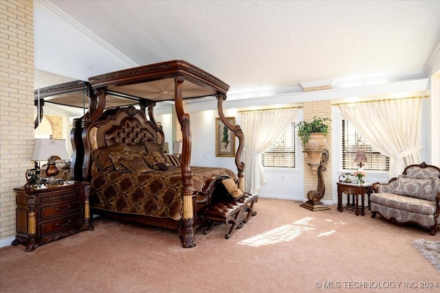 carpeted bedroom with a textured ceiling and ornamental molding