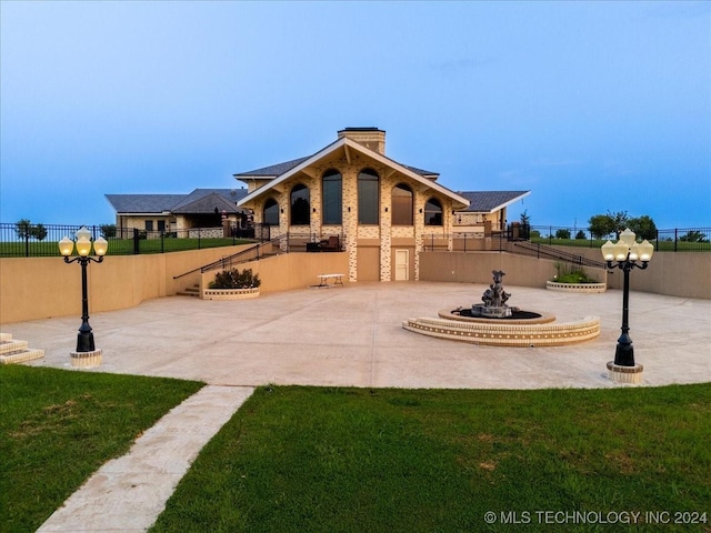 view of front of home with a front yard