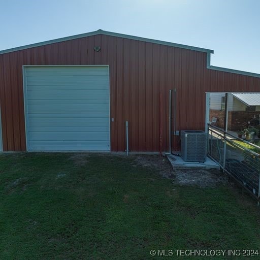 garage with central AC unit