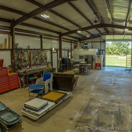 garage with a workshop area