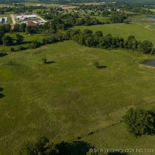 bird's eye view featuring a water view and a rural view