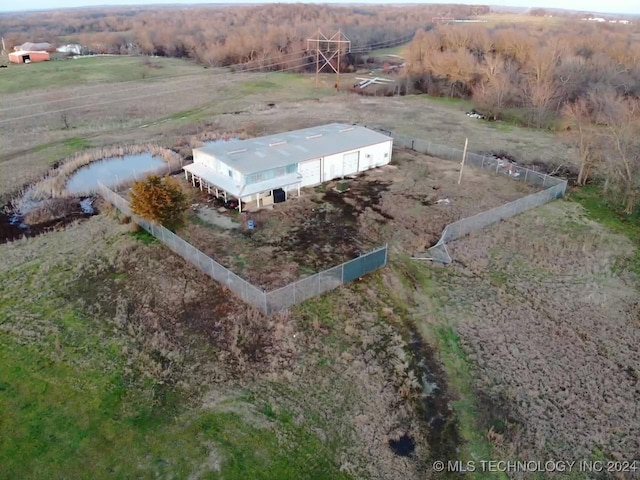 birds eye view of property featuring a rural view