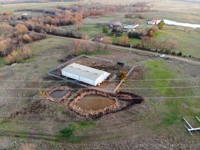 bird's eye view featuring a water view and a rural view