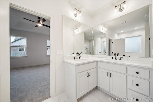 bathroom with vanity and ceiling fan