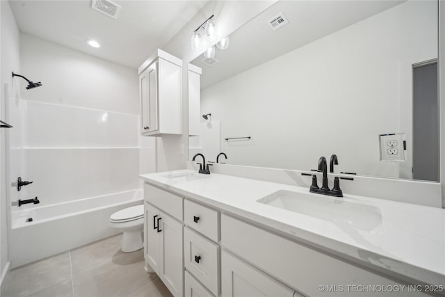 full bathroom with vanity, toilet, tile patterned floors, and shower / bathing tub combination