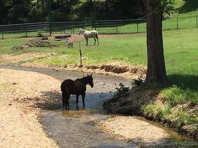 view of community with a rural view