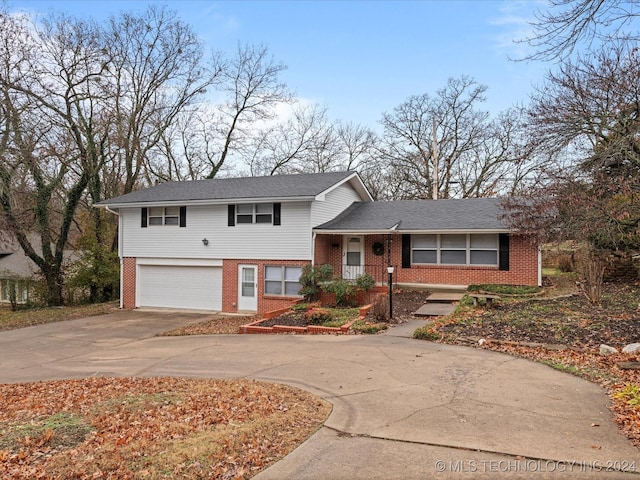 split level home featuring a garage