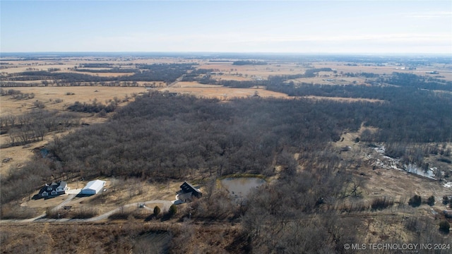 birds eye view of property featuring a rural view